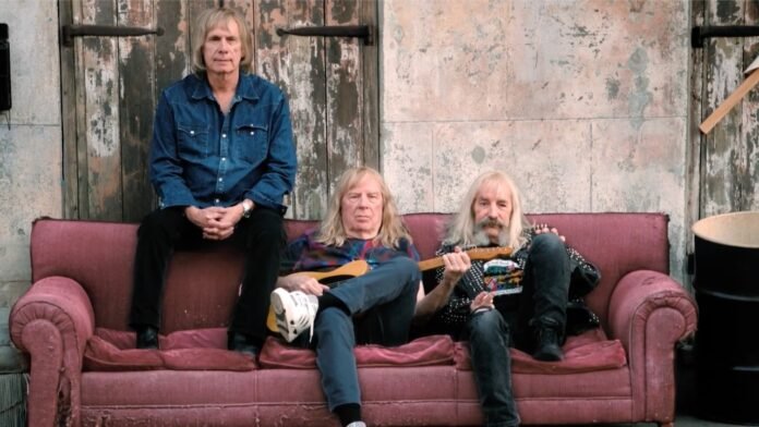 Spinal Tap Are Still Short a Drummer in the Trailer for Sequel Film: Watch