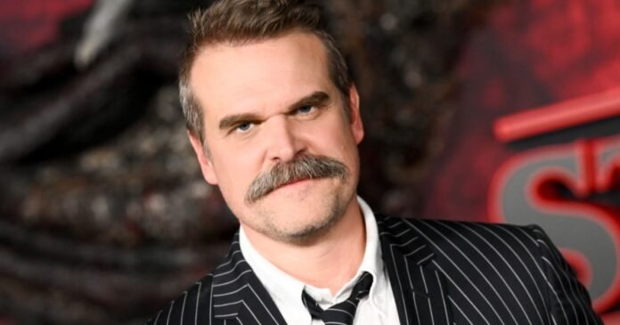David Harbour Looks Almost Unrecognizable in Evil Genius Set Photos